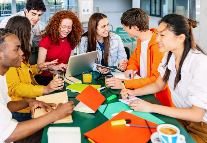 High school students group learning together at campus